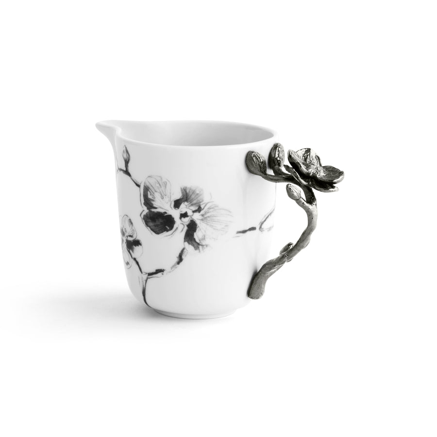 https://michaelaram.com/cdn/shop/products/michael-aram-black-orchid-porcelain-creamer-509319_900x.jpg?v=1599611162
