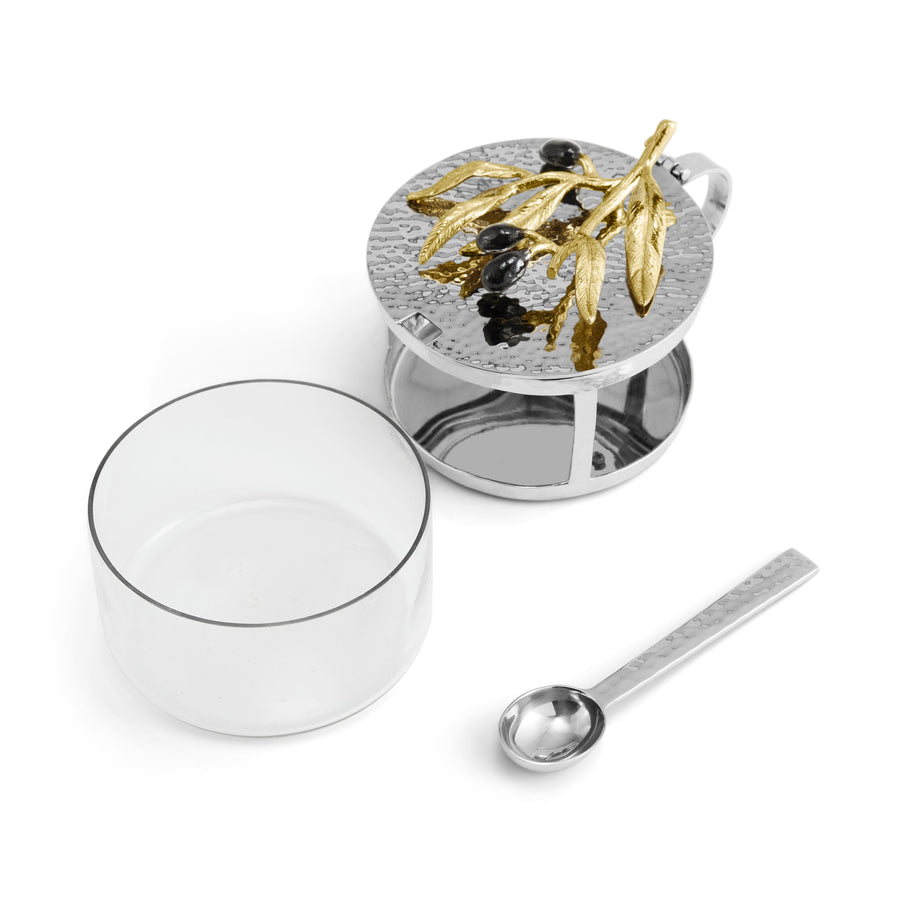 https://michaelaram.com/cdn/shop/products/michael-aram-olive-branch-condiment-container-with-spoon-323040_900x.jpg?v=1642007005